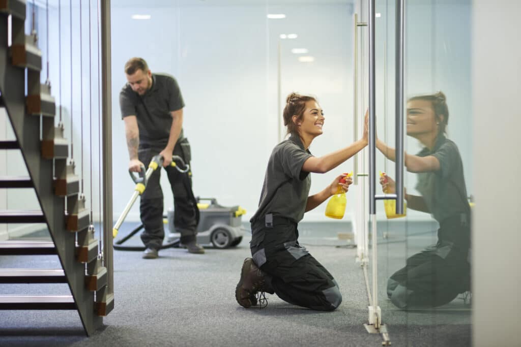 Specialists thoroughly cleaning a house, including dusting, wiping, and vacuuming for a spotless finish.